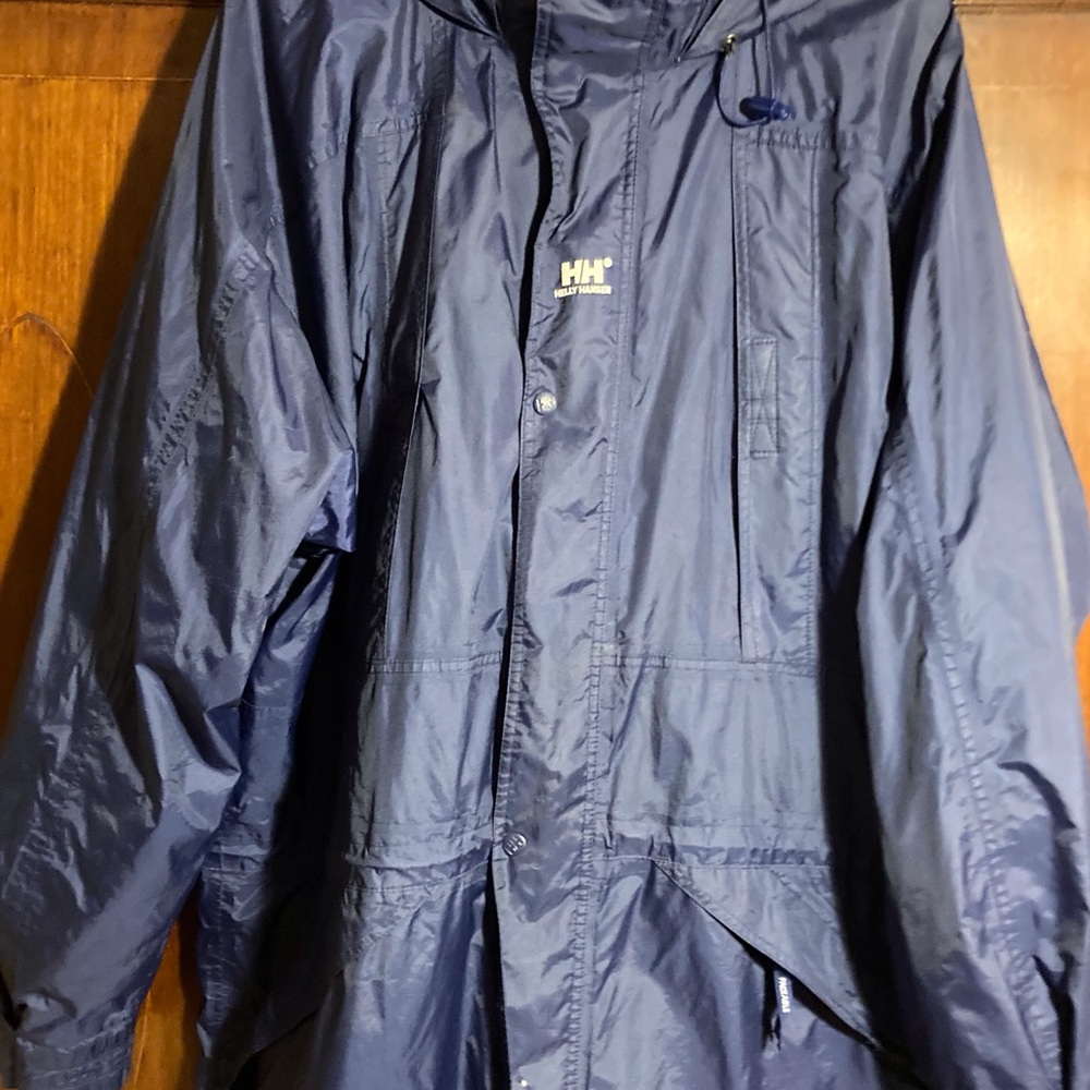 Helly Hanson dark royal blue 3/4 hooded rain jacket multiple zip pockets